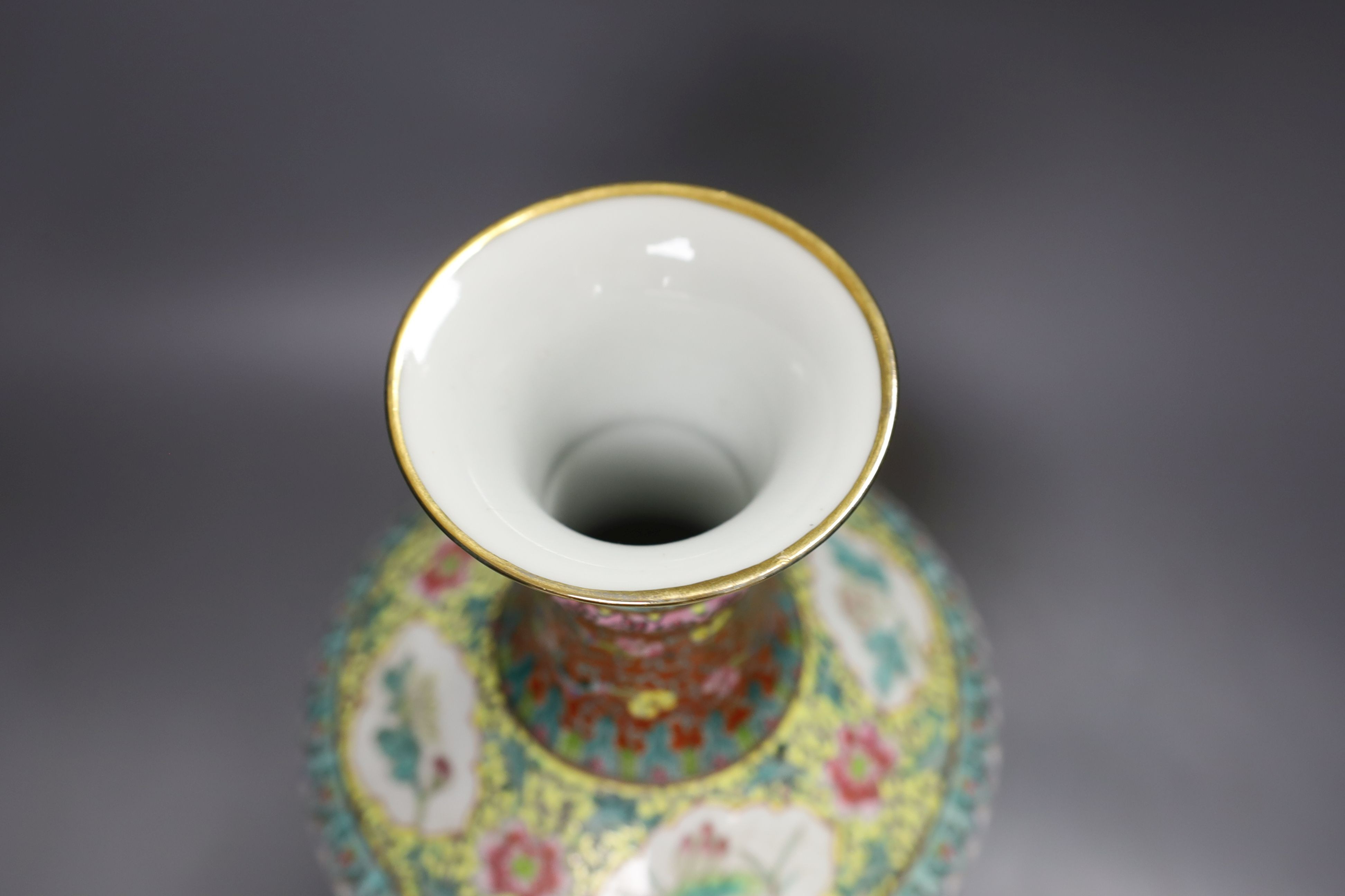 A Chinese famille rose vase, 20th century with drilled base mark - 33cm tall